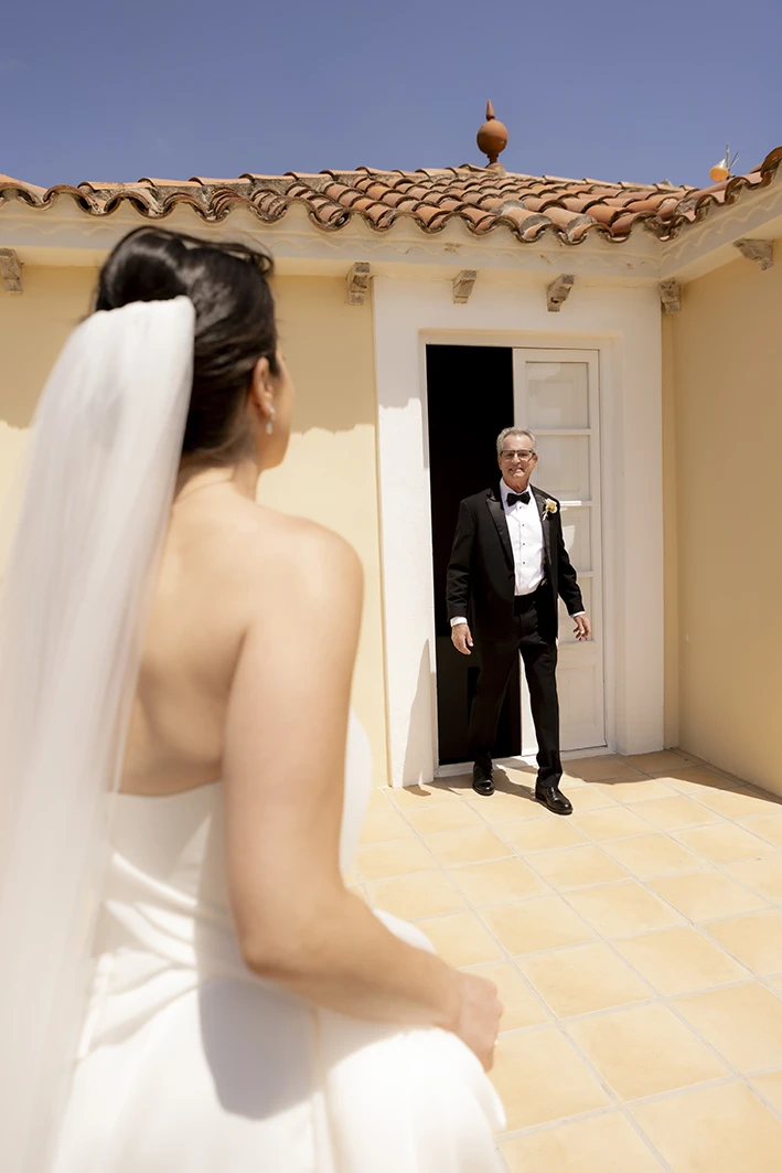 Bride seeing her father for the first time on the wedding day during a luxury wedding in Sitges.