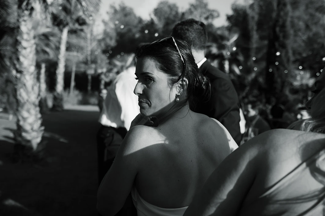 Candid black-and-white portrait of the bride at a luxury wedding in Sitges.