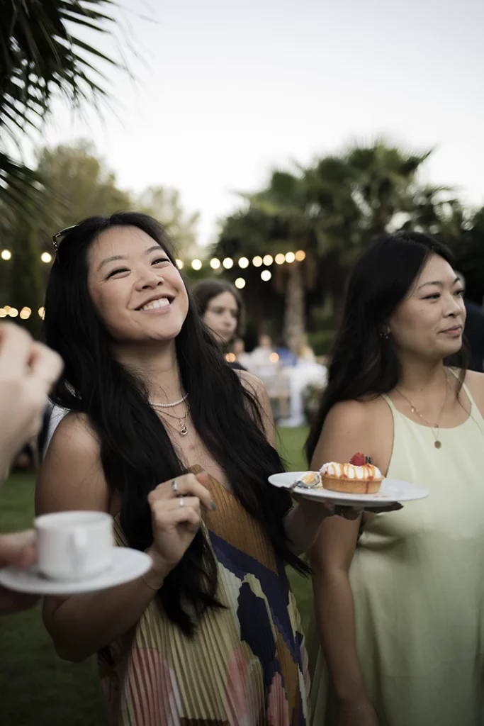 Guests enjoying dessert at a luxury wedding in Sitges.
