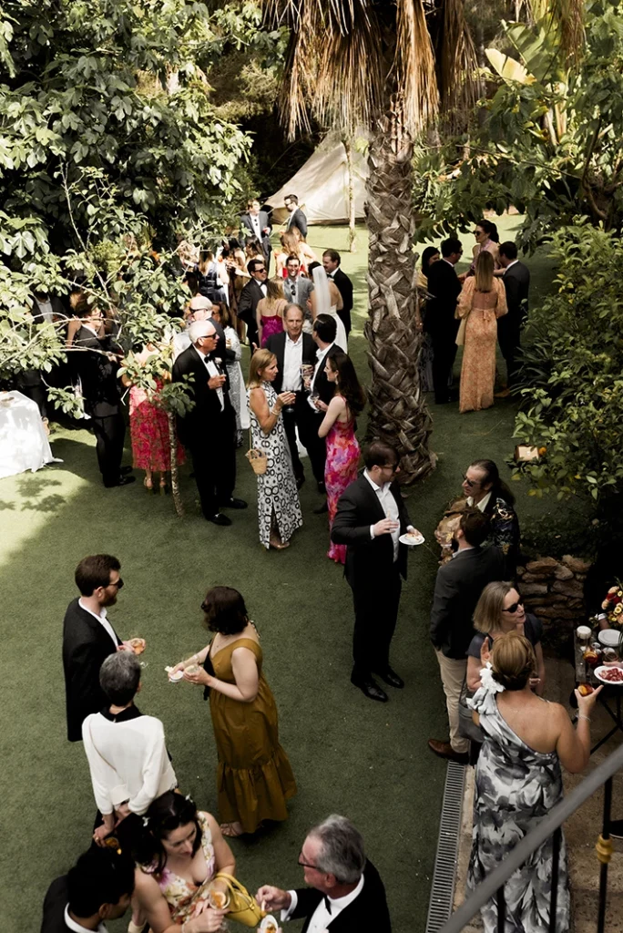 Guests mingling during the cocktail hour at a luxury wedding in Sitges.