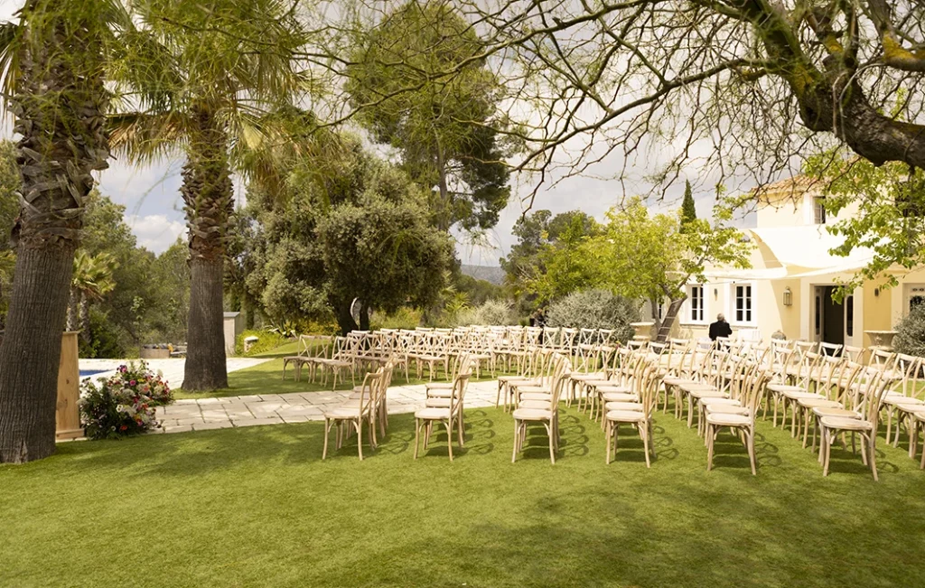 Garden ceremony seating at a luxury wedding in Sitges.