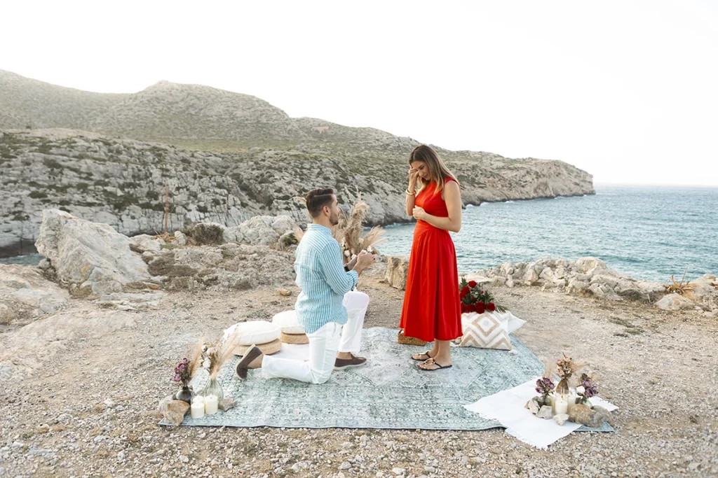Romantic proposal by the sea as part of surprises for wedding proposal in Mallorca