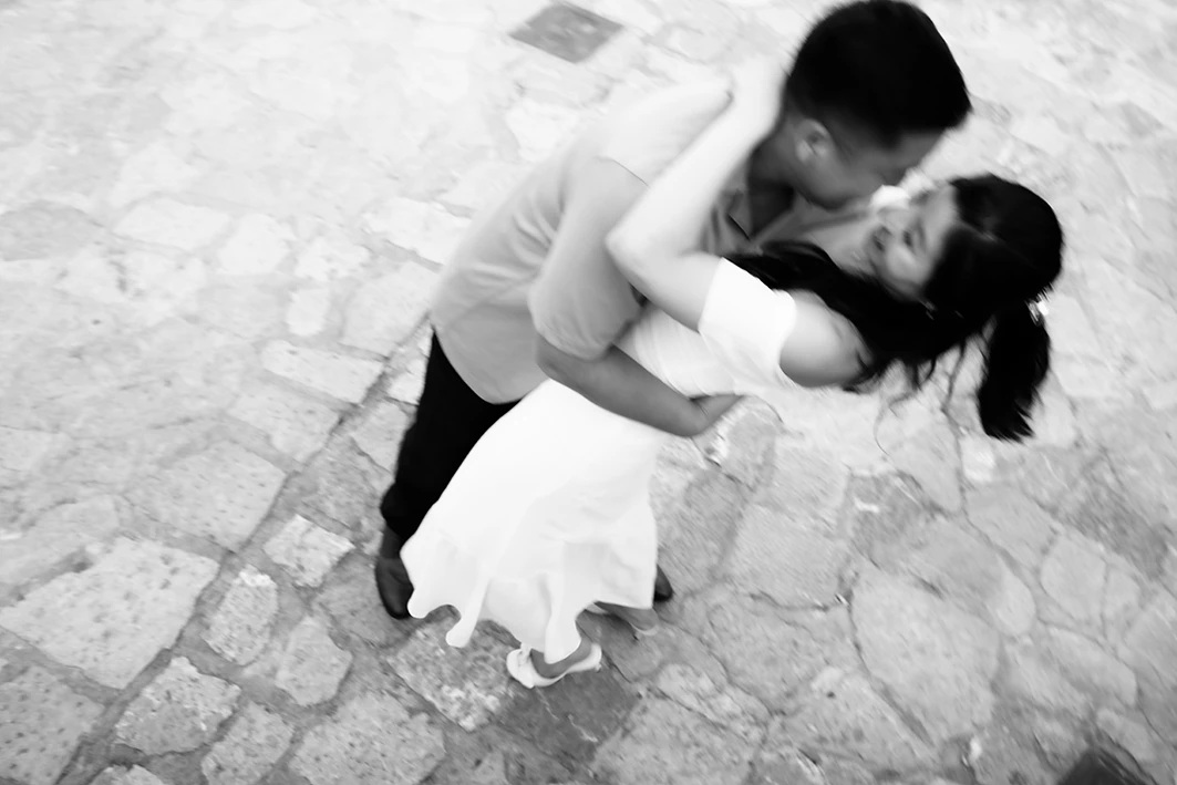 Romantic moment during a surprise proposal in Mallorca by Mathew and Emily.