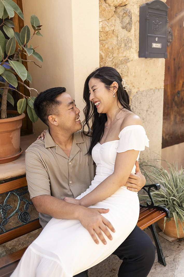 Emotional hug after a surprise proposal in Mallorca by Mathew and Emily.
