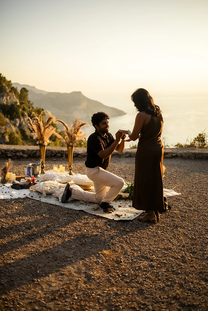 Marriage proposal in Mallorca with boho decoration in front of the sea, organised and photographed by Inma del Valle.