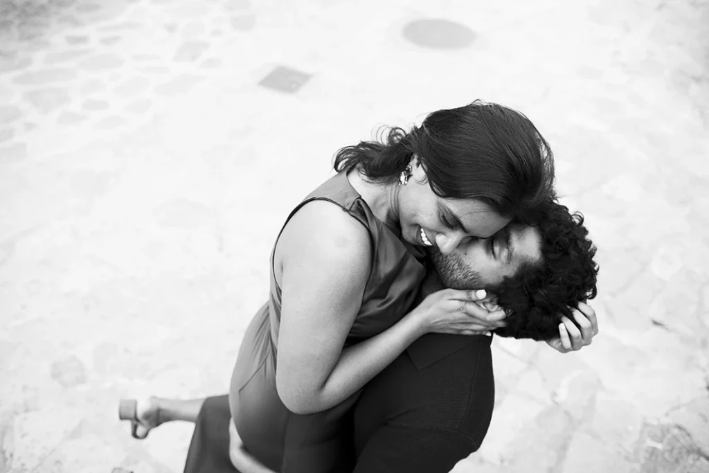 Kiss full of love after a marriage proposal in Mallorca.