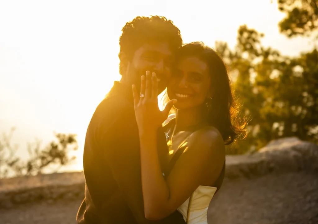 Showing the ring after the marriage proposal in Mallorca.