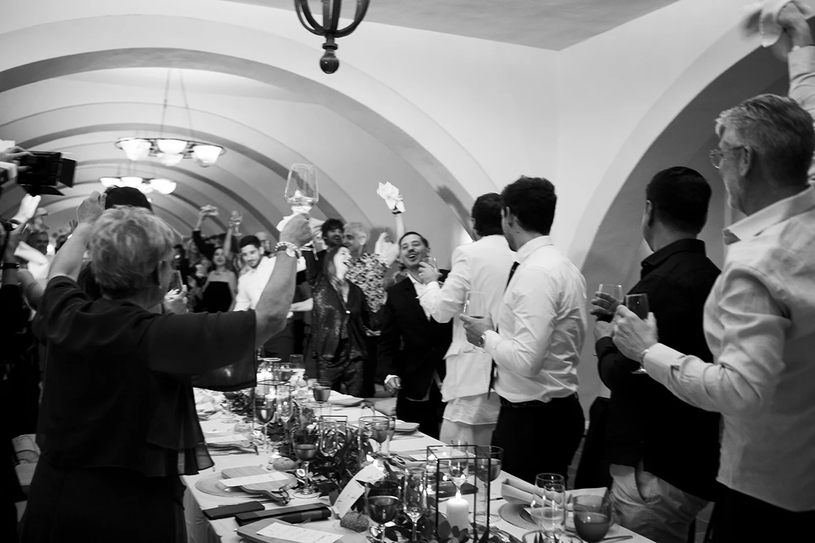 Guests raising glasses during the wedding dinner at Finca Gordiola Mallorca.