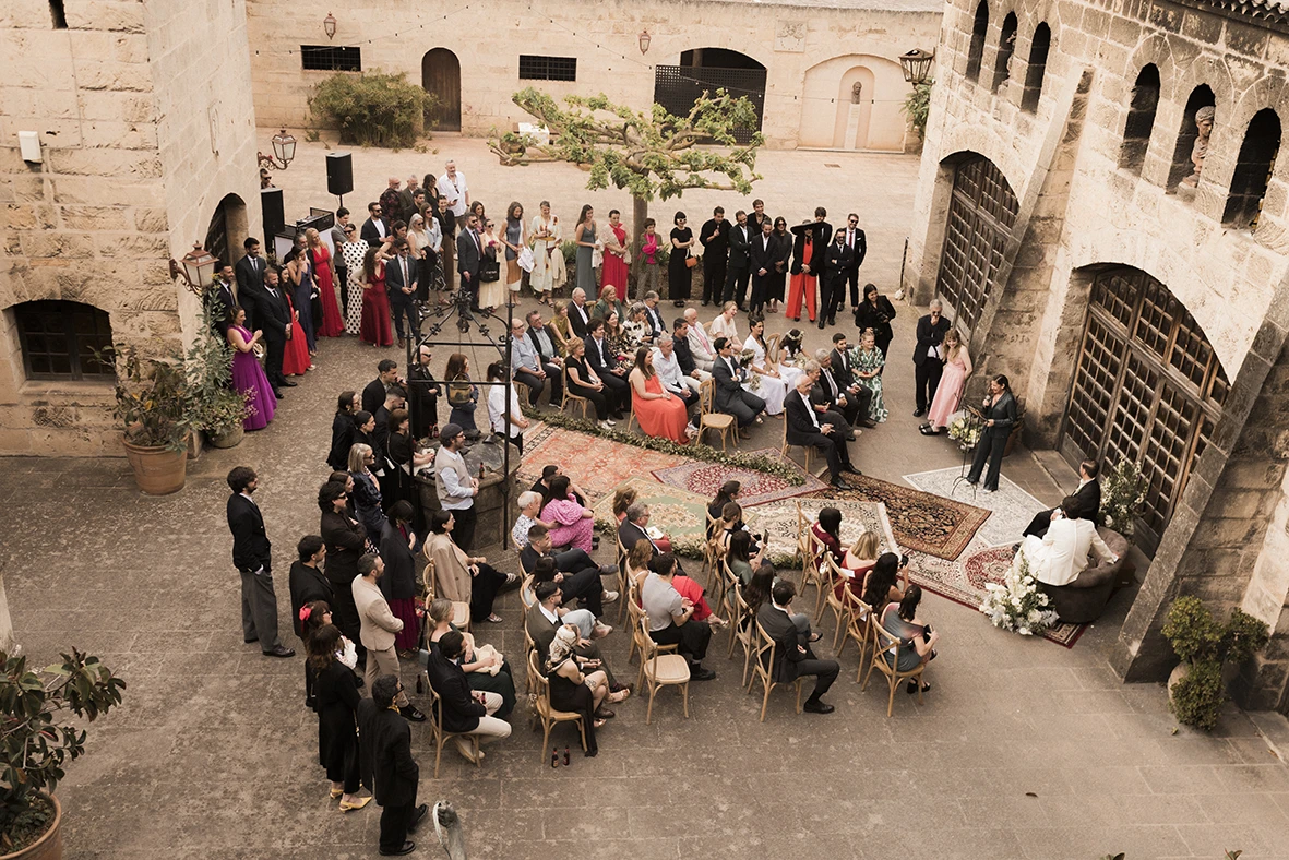 Aerial view of the wedding ceremony of Jon and Santi at Finca Gordiola.