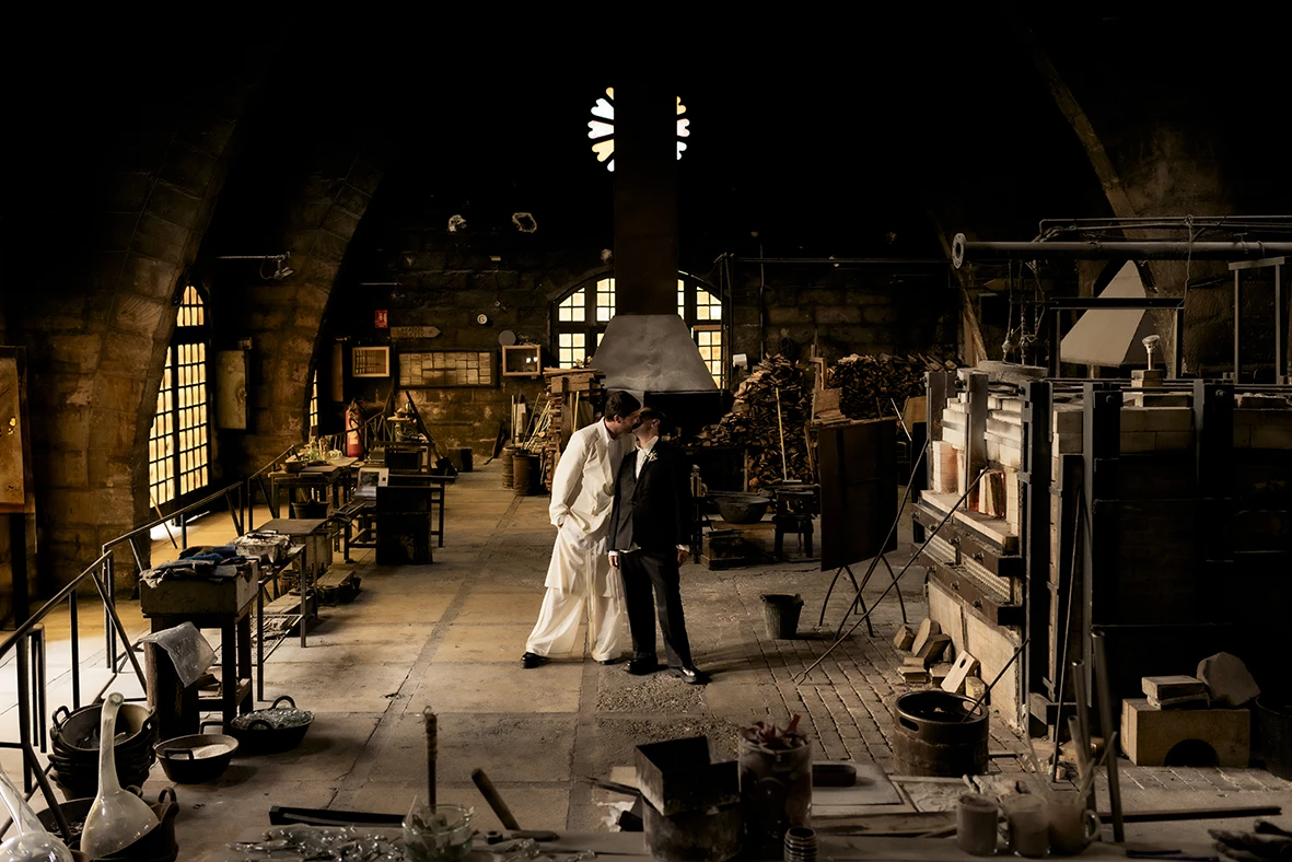 Couple standing together in a rustic room at Finca Gordiola Mallorca before their wedding.