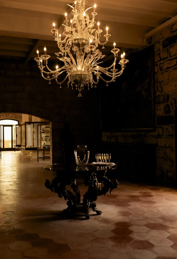 Elegant chandelier and vintage furniture at Finca Gordiola Mallorca wedding venue.