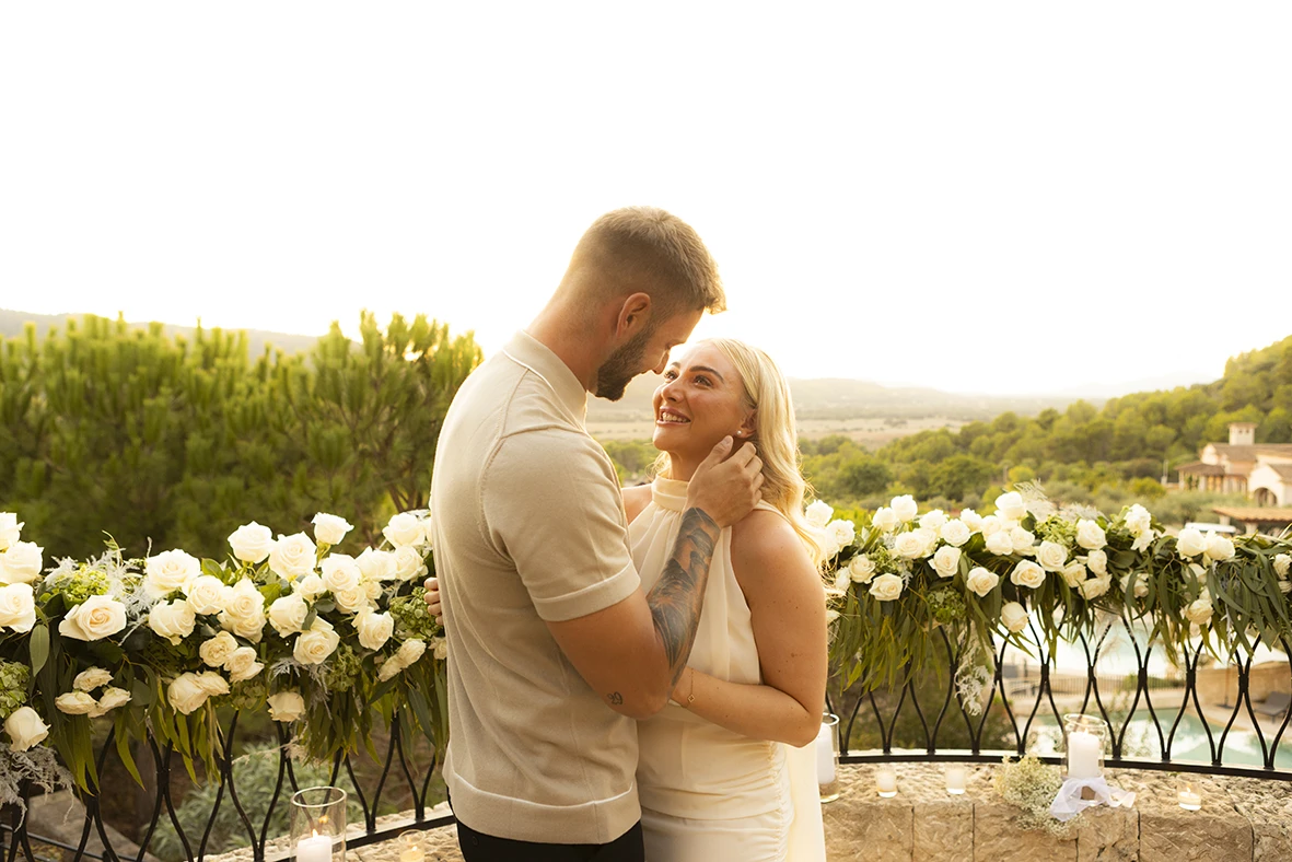 Romantic couple moment after a proposal in Mallorca.