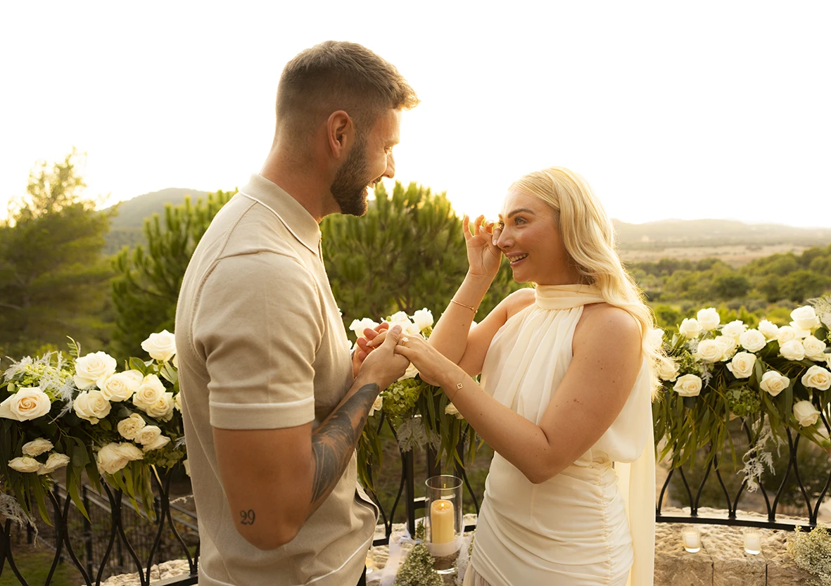 Emotional reaction during a romantic proposal in Mallorca.