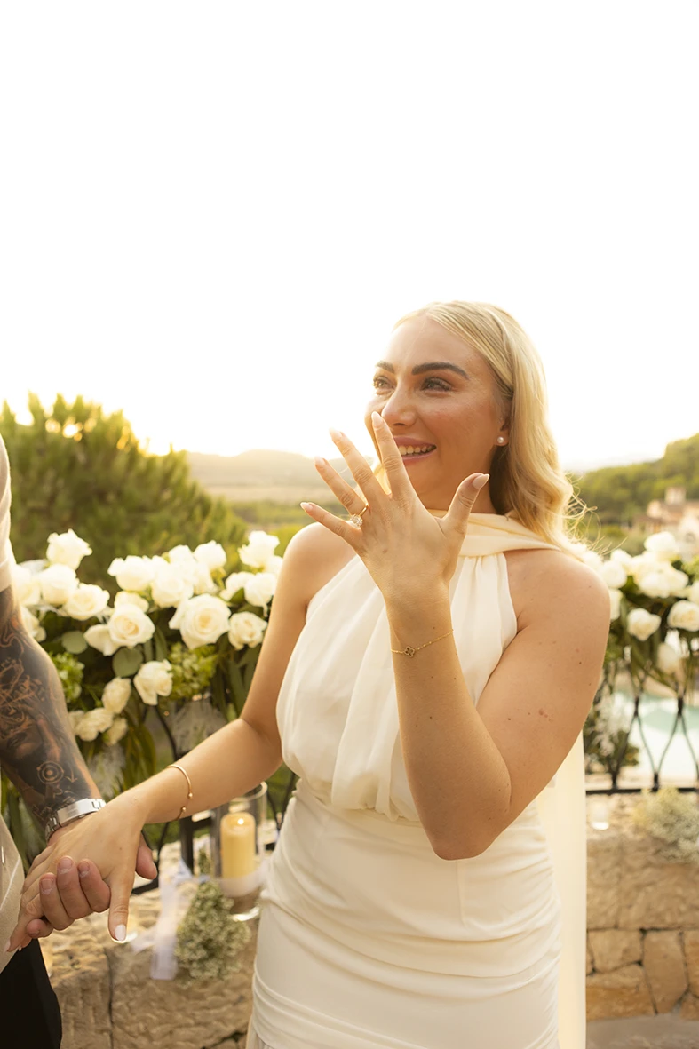 Bride-to-be showing her engagement ring after a proposal in Mallorca.
