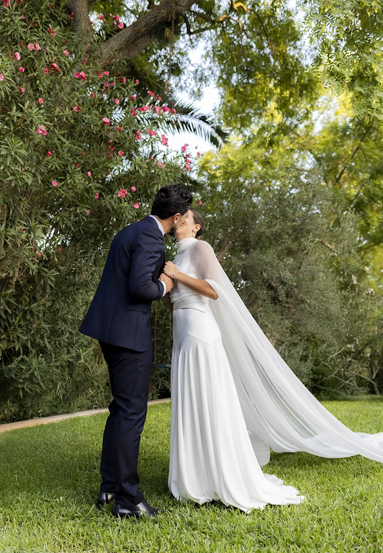 Bride and groom kissing after saying “I do” at Finca Santa Cirga – Wedding photographer in Mallorca – Inma del Valle -