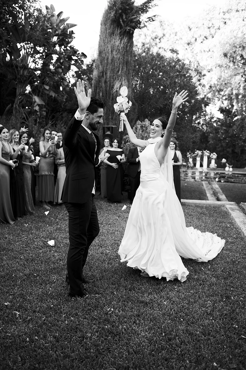 Bride and groom celebrating after the ceremony at Finca Santa Cirga – Wedding photographer in Mallorca – Inma del Valle