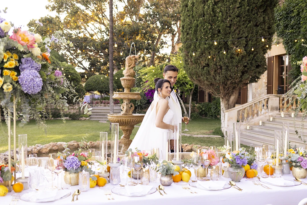 romantic wedding couple at decorated table Son Togores Mallorca