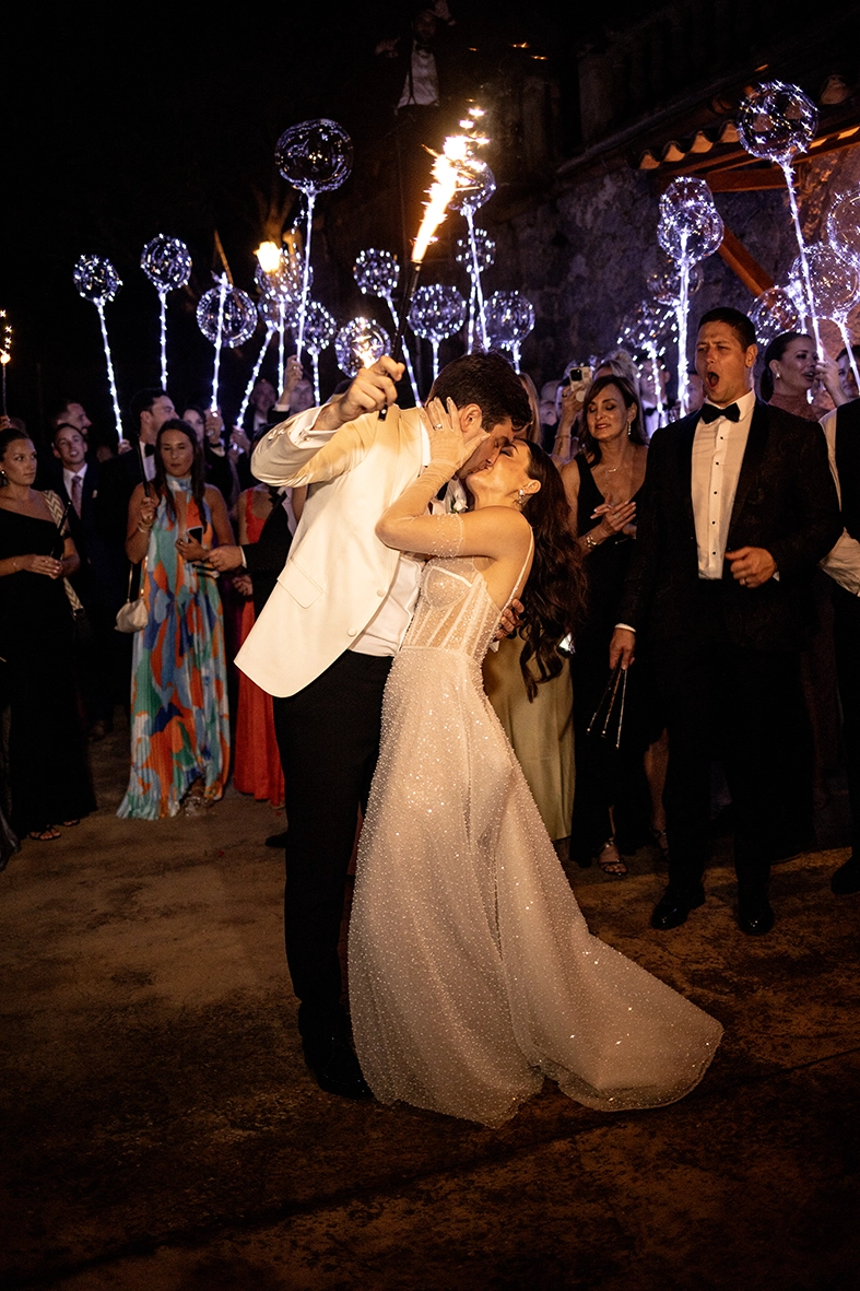 bride and groom dancing surrounded by guests at night wedding in Son Marroig Mallorca