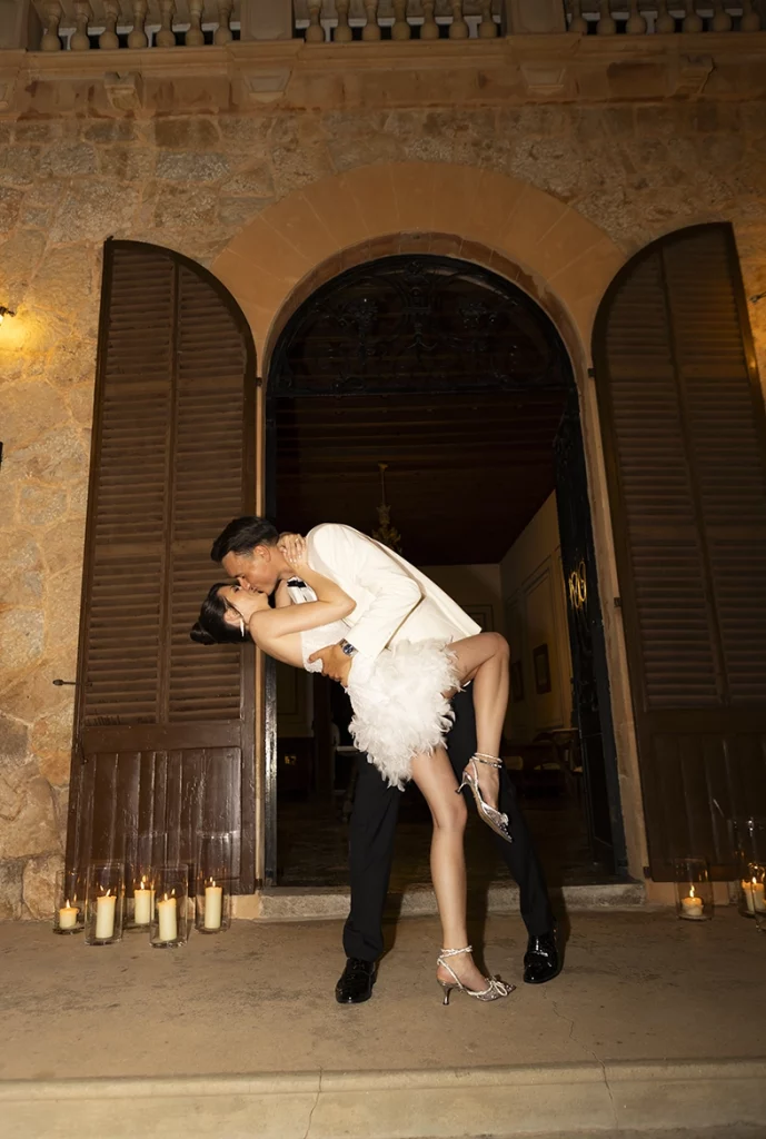 couple kissing and dancing during wedding party in Mallorca