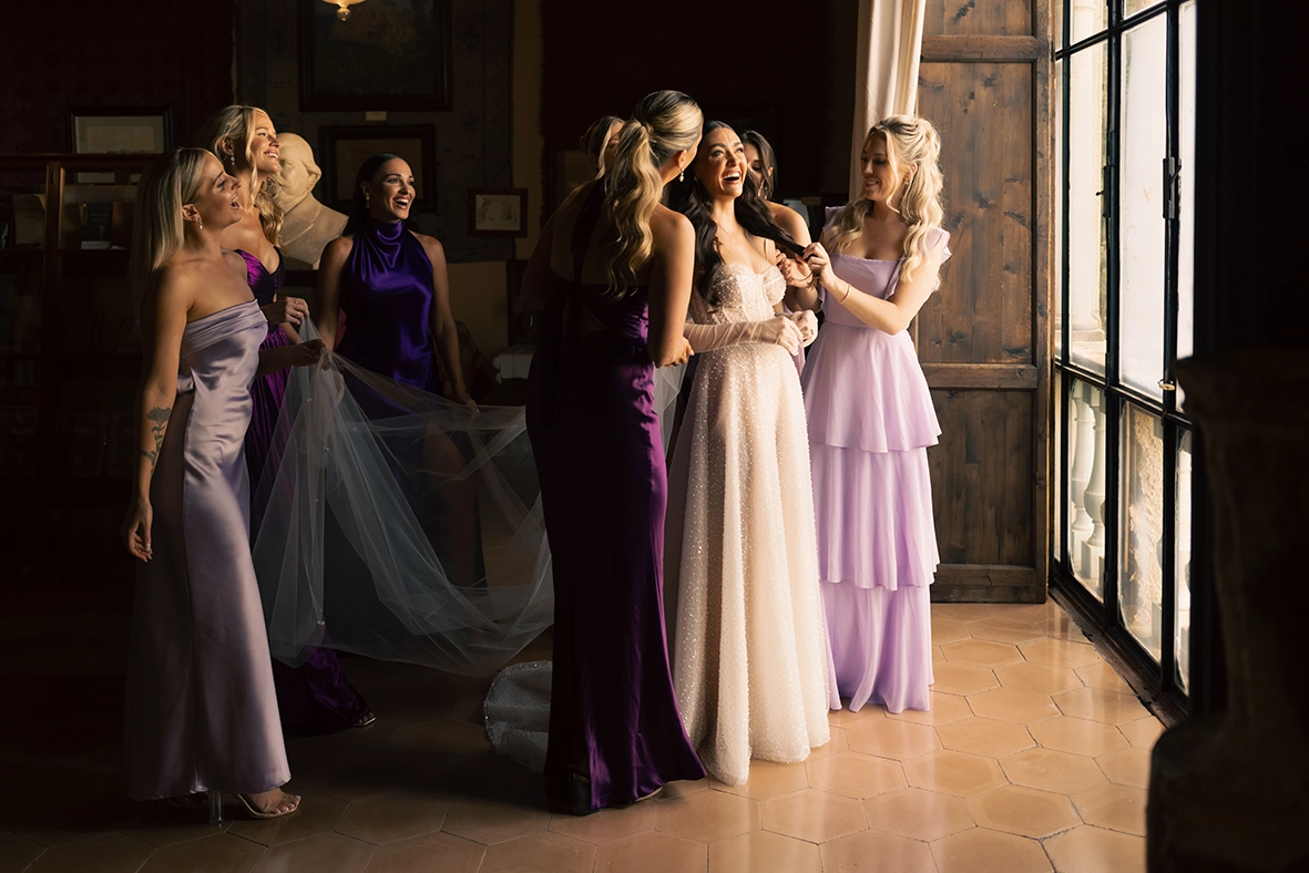 bride with bridesmaids during wedding preparations in Mallorca