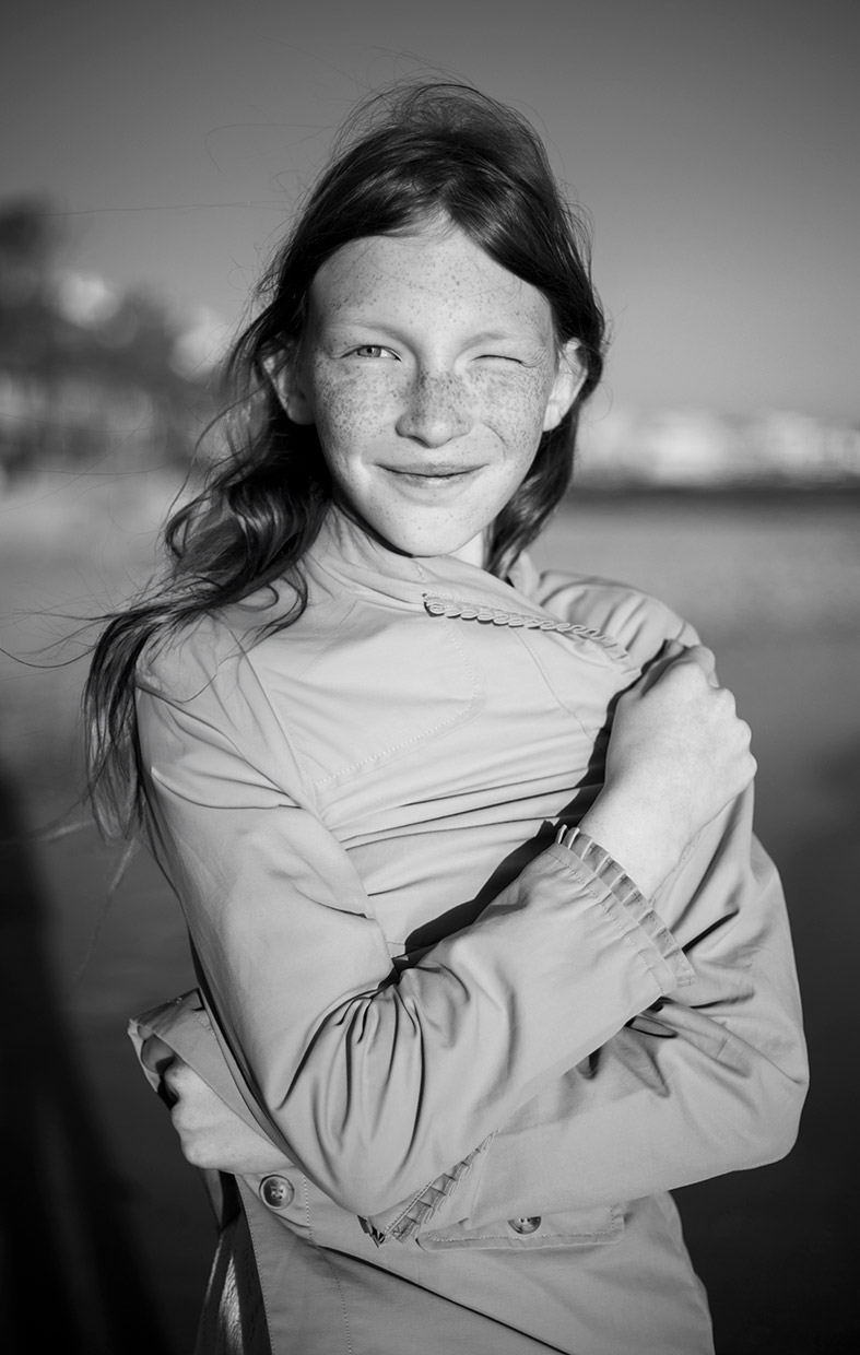 black and white portrait of young woman during studio photoshoot