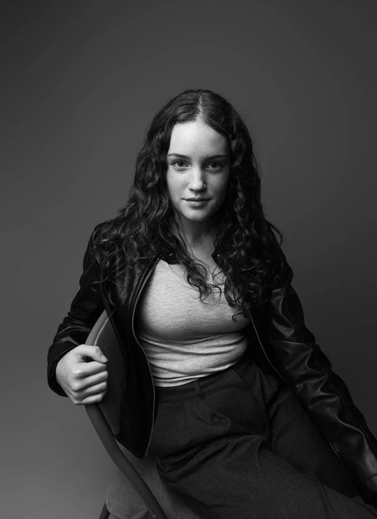 black and white portrait of female model with jacket
