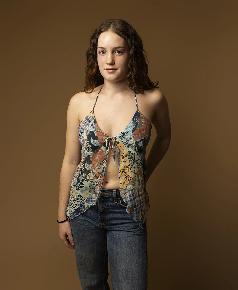 female model posing in casual outfit in studio