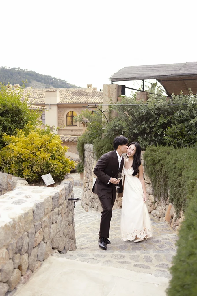 Romantic walk through Belmond La Residencia during a marriage proposal at Belmond La Residencia Deià