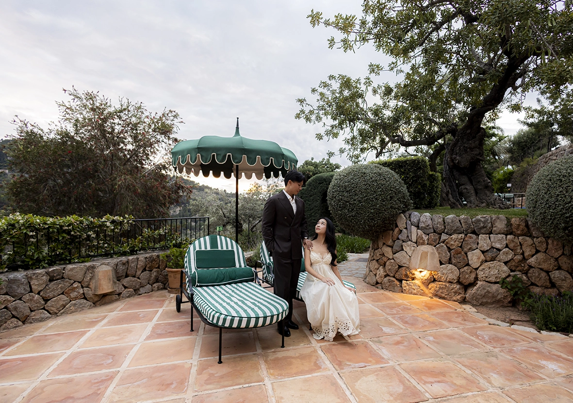 Elegant couple portrait during a marriage proposal at Belmond La Residencia Deià terrace